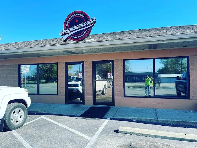 A storefront with tinted windows, a Totally Tinted job