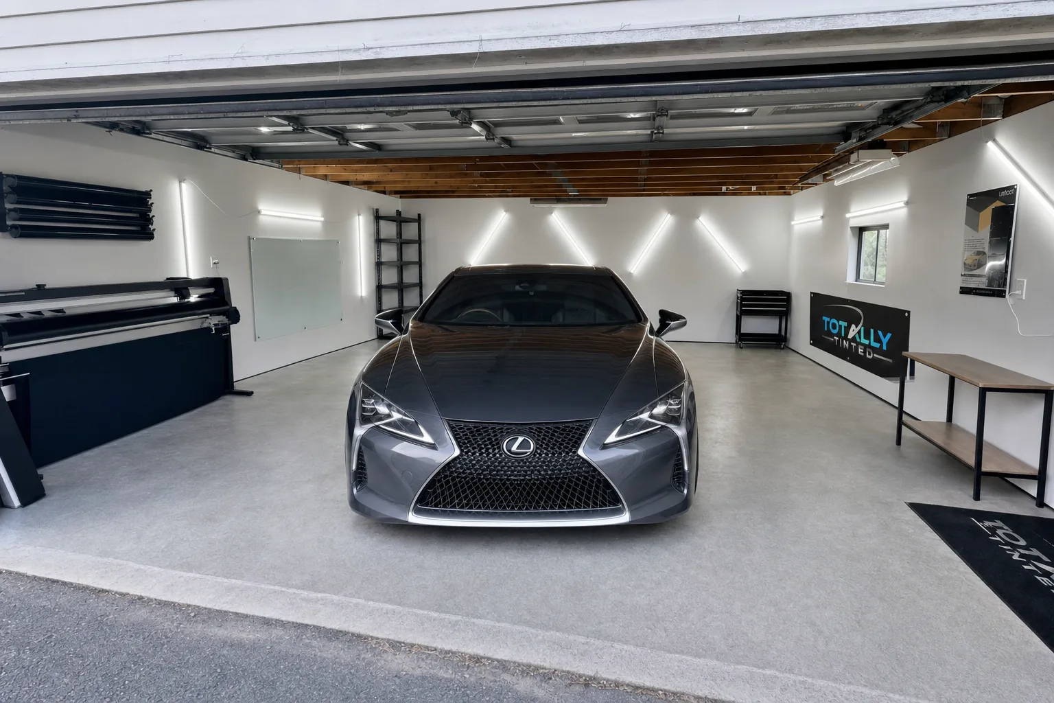 Graphite grey Lexus LC 500 with freshly tinted windows in the Totally Tinted garage studio